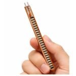 Flex sensor bent at angle showing resistance change side view