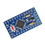 microcontroller board layout showing ATmega328P chip and surrounding SMD components on Pro Mini
