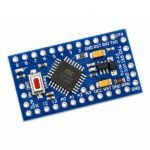 microcontroller board layout showing ATmega328P chip and surrounding SMD components on Pro Mini