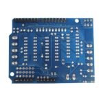motor driver shield underside with stacked header pins for Arduino board connection