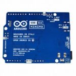 Arduino UNO R4 microcontroller and surrounding circuitry on official board