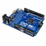 Arduino UNO R4 Minima backside with PCB traces, solder pads, and board layout details