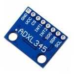 ADXL345 sensor close-up showing chip marking and SDA SCL CS SDO pin connections