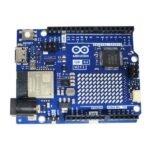 Nano Microcontroller chip on Arduino Uno R4 Minima board with surrounding circuitry