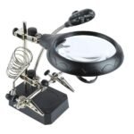 Multifunction helping hand tool with auxiliary clips for soldering and electronics work.