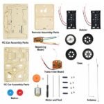 assembled RC car with remote controller and battery compartment for robotics projects