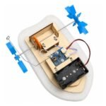 Remote Control DIY Paddle Wheel Boat Kit assembled model with dual paddle wheels and battery pack mounted on base