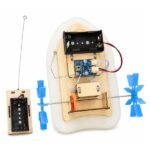 STEM kit paddle boat structure showing internal motor placement and battery holder installation