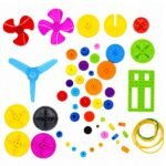 Colorful Plastic Motor Gear set with assorted sizes, shapes, and shafts arranged together
