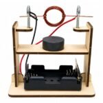 DIY Wooden Electromagnetic Motor Kit assembled with wooden base, copper coil, magnets, and spinning rotor