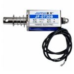 JF-0730B solenoid close-up showing plunger tip mounting flange and cable connection point
