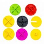 assortment of small plastic gears for robotics gear projects showing different tooth patterns and sizes