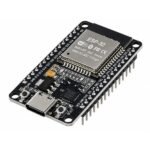 esp32 board showing ESP32 module with metal shield and onboard PCB antenna section