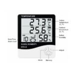 Thermohygrometer display showing temperature and humidity reading close up