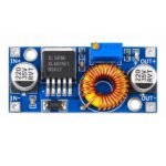 XL4005 buck converter module IC chip potentiometer and pads close up